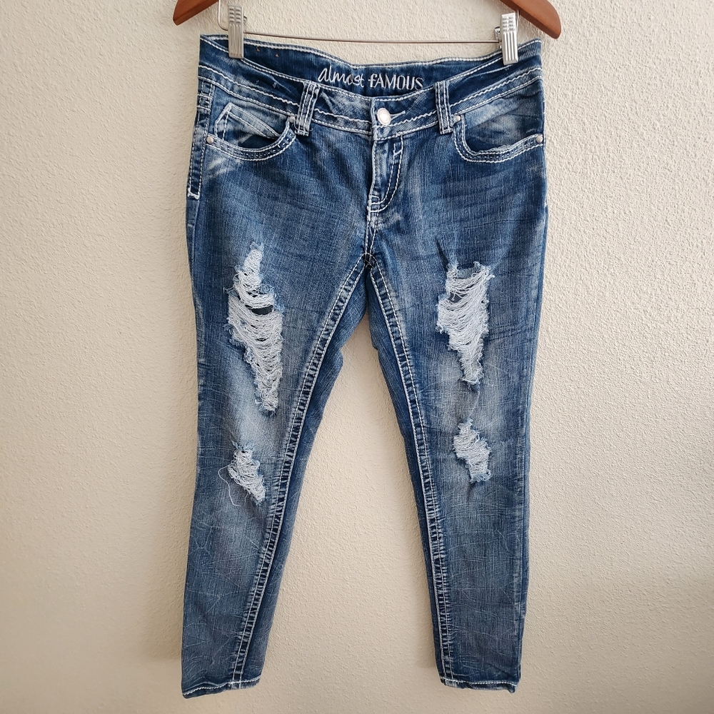 Ladies Almost Famous Distressed Blue Jeans Size  7 skinny